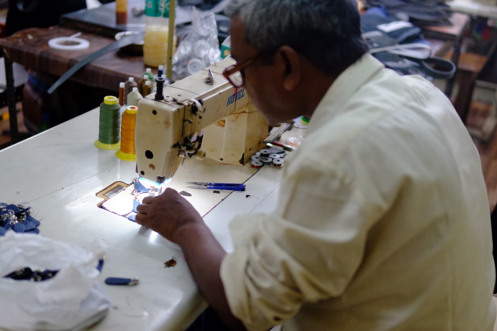 Artisan at the sewing machine